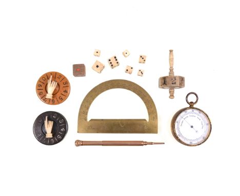 A collection of playing cards, whist markers and bone dice, claw pipes, drawing instruments, pocket barometer, whistle, penkn