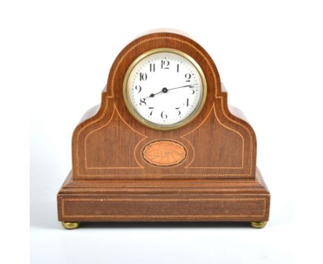 Edwardian mantel clock, domed mahogany case with inlaid outlines and shell motif, white circular dial with Arabic numerals, F
