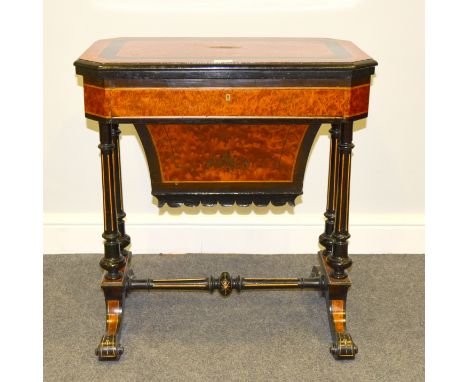 A birds eye maple and ebonised games/work table, foldover and turn games table above a single frieze drawer with pull out wel