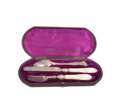 Victorian silver knife and fork with carved mother of pearl handles, with associated spoon, cased.