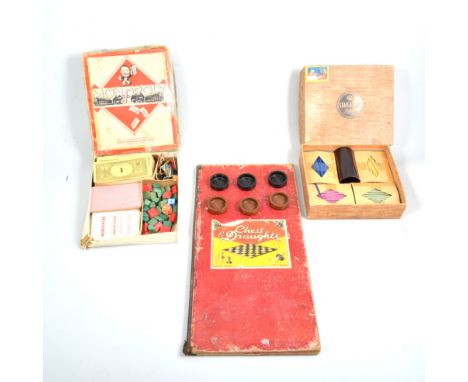 Vintage board games including Scrabble and Monopoly.