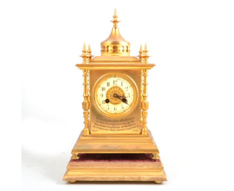 A 19th Century Vincent & Cie gilt shelf clock with plinth, the 7.5cm cream arabic numeral chapter ring with outer minutes rin