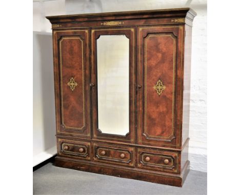 Victorian simulated yew wood triple wardrobe, with transfer decoration, centre door with a mirrored panel, three drawers unde