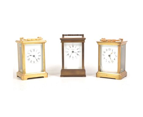 Three brass carriage timepieces, two French with cylinder escapements and a modern Angelus timepiece, four various travelling