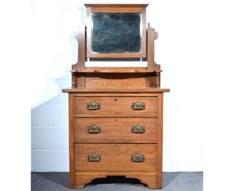 Edwardian oak dressing chest, rectangular mirror back, above an open shelf, on rectangular top above three drawers, W88cm x D