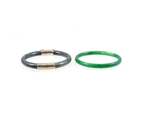 A collection of jade and aventurine quartz jewellery, two slave bangles, a 30mm heart pendant, a 40mm heart in a metal frame,