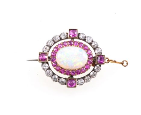 An opal, diamond and pink sapphire brooch, the oval cabochon cut opal 13mm x 10mm is surrounded by twenty pink sapphires, the