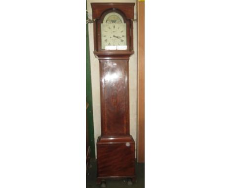 George III mahogany long case clock, the arched hood flanked by fluted pilasters over a trunk door, the painted dial with moo