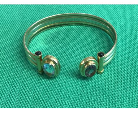 18ct gold, topaz & amethyst bangle, 24.9g PLEASE always check condition PRIOR to bidding or email us with a condition report 