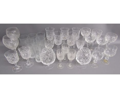 Collection of glassware includes tumblers, red wine glasses, white wine glasses, brandy glasses etc