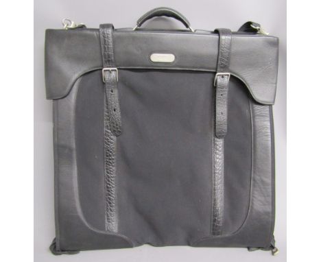 Samsonite Black Label garment bag&nbsp;by Alexander McQueen with black and white feather design liner and thumb print design 