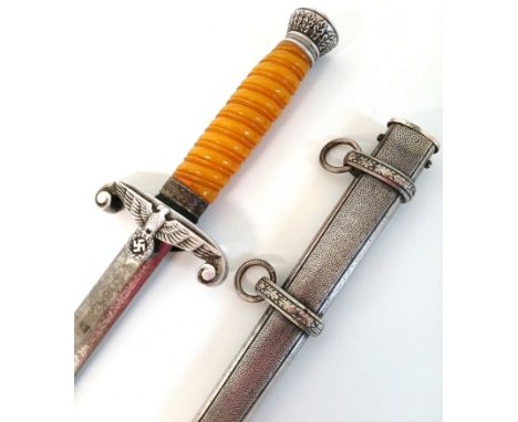 German military World War II army officer's dagger with scabbard, the steel blade etched with maker's name Siegfried Solingen