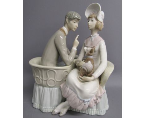 Lladro 'You and I' 4830 You and me couple in tete a tete chair with dog - approx. 27cm x 21cm x 17cm