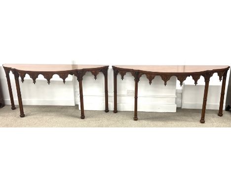 Large pair of Arthur Brett reproduction Chippendale gothic influence console tables in mahogany with cross banding to the ser