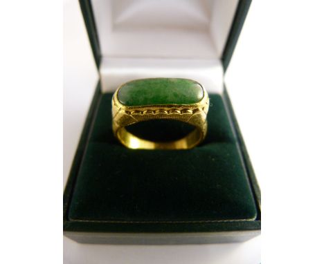 24ct (999.9) chinese saddle ring set with imperial jade. Approx 16.7mm x 7.5mm across Size Q total weight 8.6g