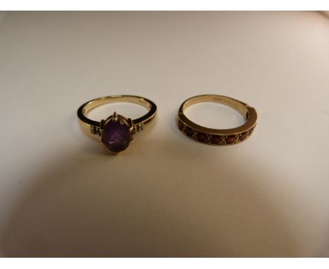 Two 9ct yellow gold rings with an Amethyst stone approx 8.5mm x 6.14mm with a small diamond set in each shoulder Size M. Half