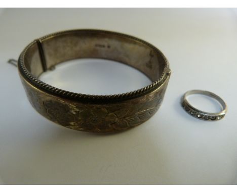 Hallmarked silver bangle along with a silver CZ ring