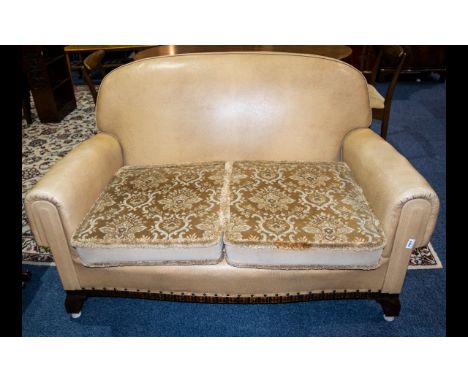 An Early 20th Century Two Seater Sofa art deco, tab sofa with x2 removable cushions. Length 56 inches, height 34 inches, dept