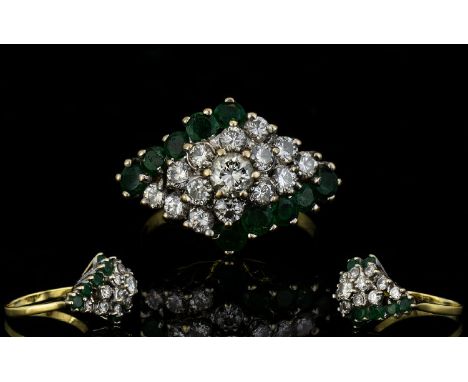 18ct Gold Attractive 1970's Emerald Cluster Ring flowerhead design. The diamonds of good colour and clarity. Est diamond weig