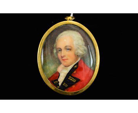 Framed Portrait Miniature Depicting a Georgian gentleman in red topcoat. Housed in oval gilt mount. 4 inches in length, pleas