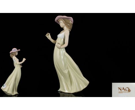 Nao by Lladro Porcelain Figurine ' Gentle Breeze ' Model No 1158. Height 10.5 Inches - 26.5 cm. Please Note that the Flower I