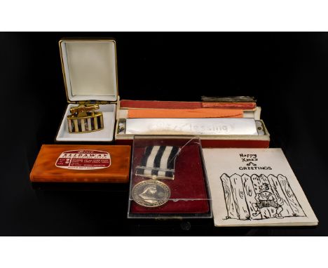 A Miscellaneous Collection To include retro 'Slideaway' clothes brush, reproduction medal, blessing harmony harmonica and vin