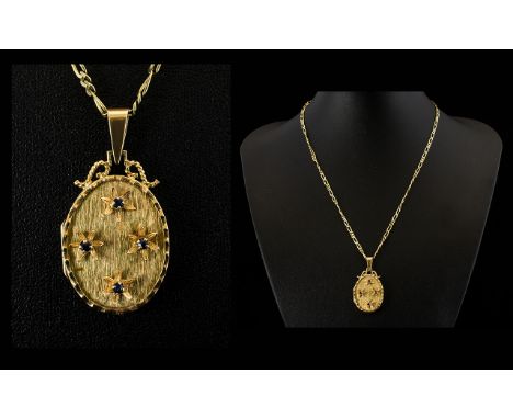 Ladies Attractive 9ct Gold Oval Shaped Hinged Locket Attached to a 9ct Gold Fancy Chain. The Front Panel of The Locket Decora