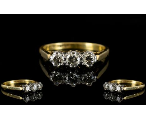 18ct Gold Gallery Set Attractive 3 Stone Diamond Ring, The ( 3 ) Round Brilliant Cut Diamonds of Good Colour / Clarity. Est D