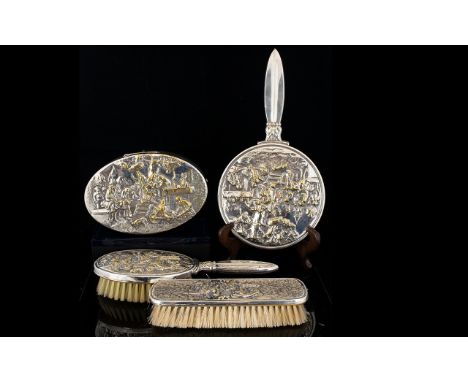 A Danish White Metal Vanity Set four items in total to include hand mirror, trinket box, hair brush and clothes brush. Each o