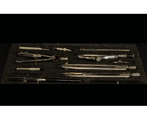 Boxed Faber Castell slide rule, boxed scale rule and draughtsman's 11 piece instruments set in fitted case. Please note one p