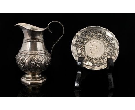 Chinese White Metal Trinket Dish With Coin Base Patterned with raised decoration of the zodiac, together with a white metal I