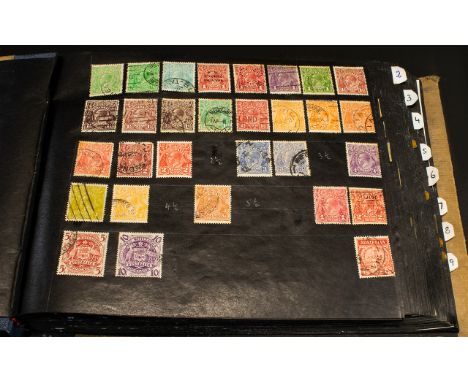 A Stamp Album Containing A Mixed Collection Of Commonwealth And International Stamps To include Australian ten shilling stamp