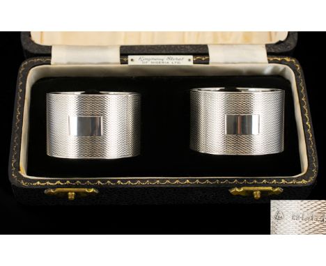 A Boxed Pair of Fine Quality Silver Napkin Holders, Engine Turned with Vacant Cartouches. Hallmark Birmingham 1958, Boxed. 75