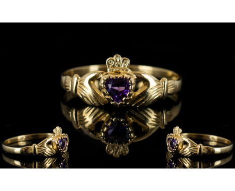 9ct Gold Attractive Claddagh Design Dress Ring set with central heart shaped amethyst held between two joined hands.  Fully h