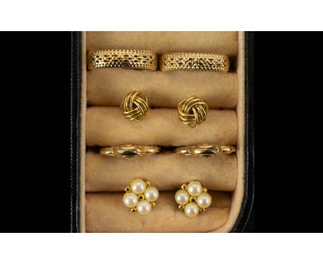 A Collection Of 9ct Gold Earrings Each fully hallmarked, each in good condition to include knot stud earrings, creole earring