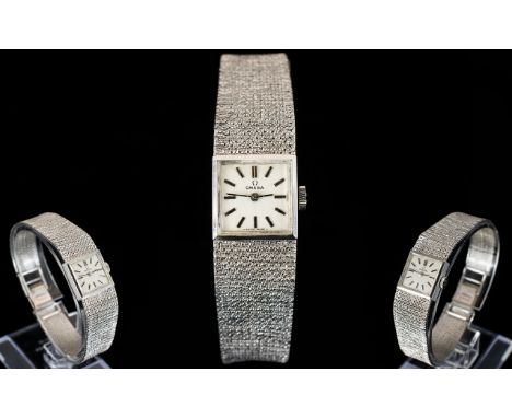 Ladies 9ct White Gold Omega Wristwatch Square silvered dial, baton numerals, manual wind, 9ct white gold integral mesh bracel