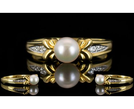 18ct Gold - Attractive Pearl and Diamond Set Dress Ring. The Central Pearl with Diamond Shoulders. As New Condition. Fully Ha