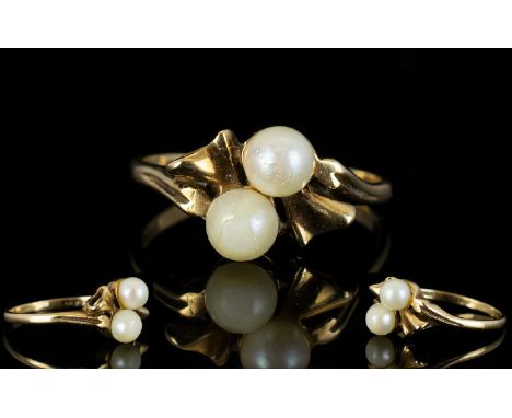 Ladies Attractive Pearl Set 9ct Gold Dress Ring, The Two Pearls Set In a Bow Tie Design. Full Hallmark for 9ct. Ring Size - Q