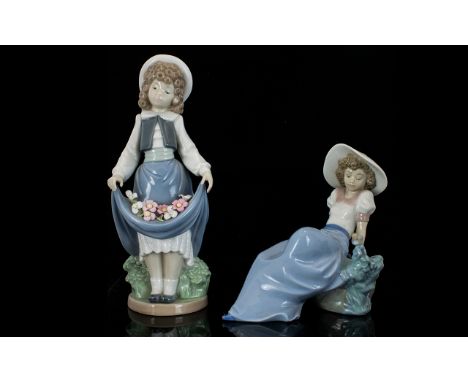 Two Nao Figures one depicting a young woman with flowers in her pinafore, approx 9" high, and the second figure of a young wo