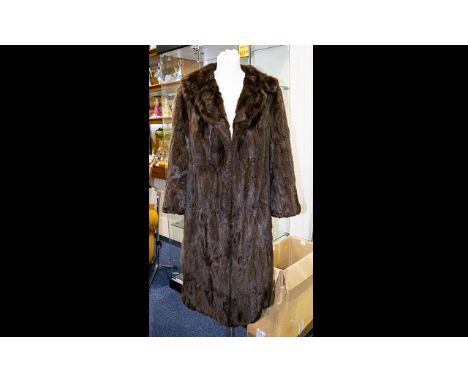 Mink Coat Dark Brown from Fletcher of Southport.  Fully lined in brown polysilk fabric.  Made by M Fletcher, Master Furrier o