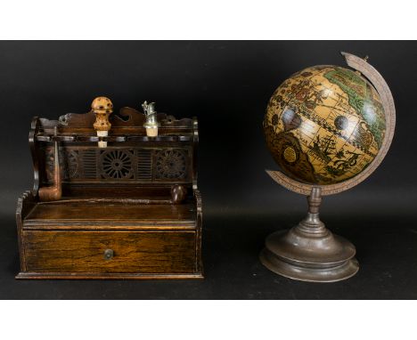 Oak Pipe Stand Aged patina with six aperture shelf for pipe storage above single drawer, together with two wooden pipes and t