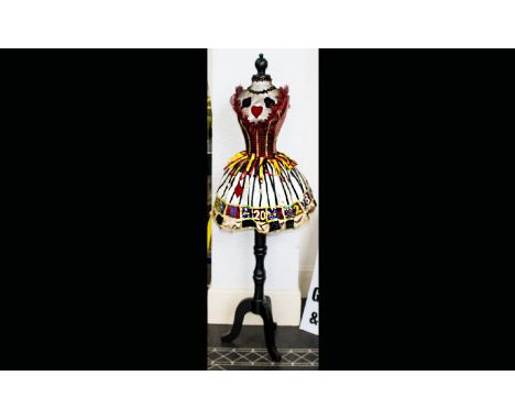 Mannequin With Casino Theme, Painted Black With Tutu Style Dress, Decorated In Casino Theme. Height 60 Inches.
