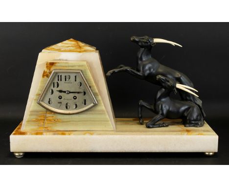Art Deco Figure Group Mantle Clock Raised on two tone rectangular base of cream striated marble with green onyx obelisk form 