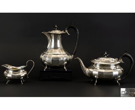 1930s Period Silver 3 Piece Tea & Coffee Service with Ribbed Body Design.  Raised on hoof feet.  Comprises:  Tea Pot, Coffee 