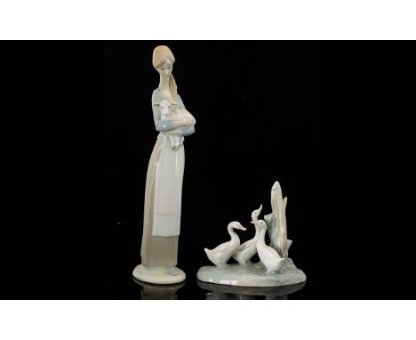 LLadro Girl With Lamb Figure Number 4505, marked to base, together with a Nao figure group of three ducks. Each in good condi