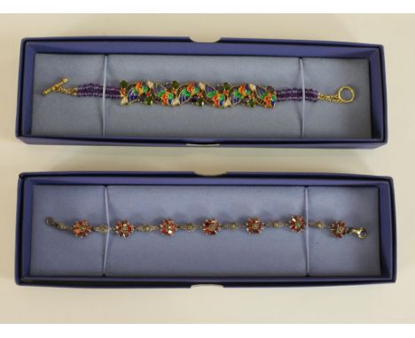 Two boxed gem-set bracelets, one with a pierced gold plated cockatoo design with colourful enamel, amethyst bead bracelet and