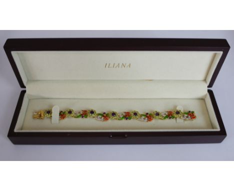 A boxed Iliana gold plated silver fashion bracelet set with peridot and amethyst in a floral design, enamel detailing to the 