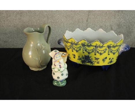 Three pieces of 20th century decorative ceramics comprised of a Danish porcelain spill holder modelled in the form of a lady,