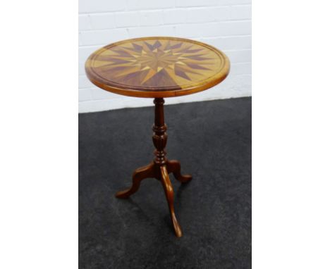 Inlaid wine table, with star burst circular top, pedestal column and tripod supports, 56 x 40cm 