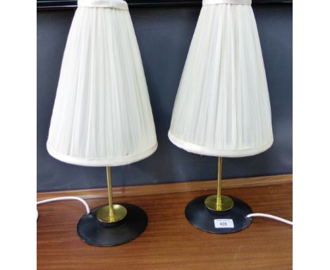 Pair of retro table lamp bases, together with a brass candlestick style lamp base, (3) 